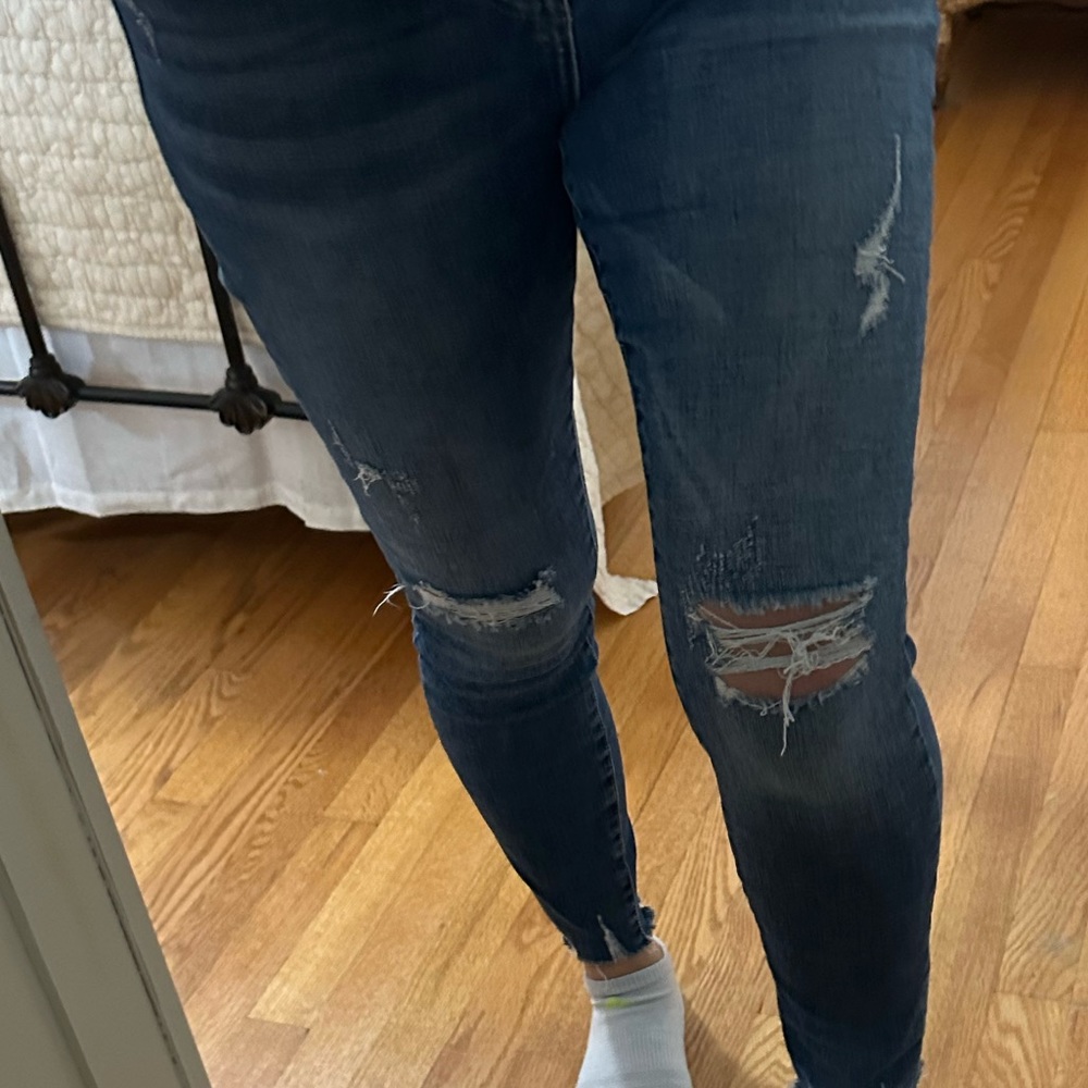 Distressed pistola jeans